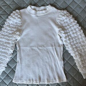 Girls’ Ribbed White Top with Textured Sleeves